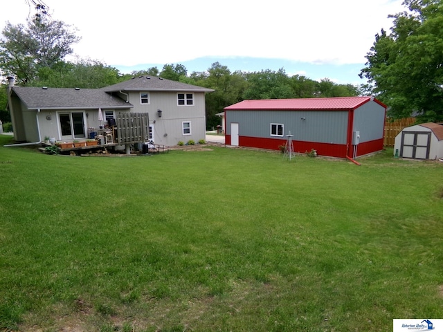 1304 S 4th Ave, Beatrice, NE 68310 - back of property with a yard and a deck