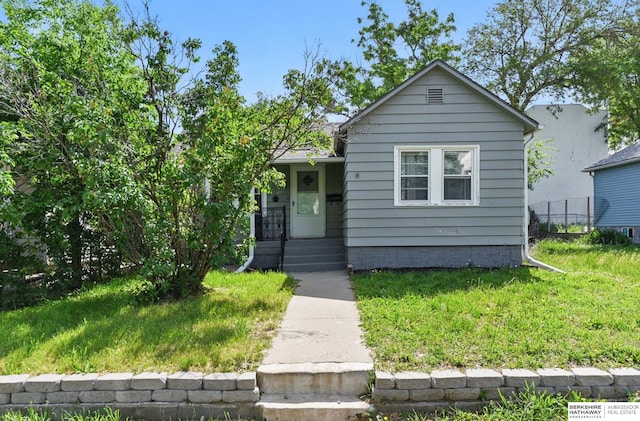 1409 S 17th St, Omaha, NE 68108 - view of front of home featuring a front yard
