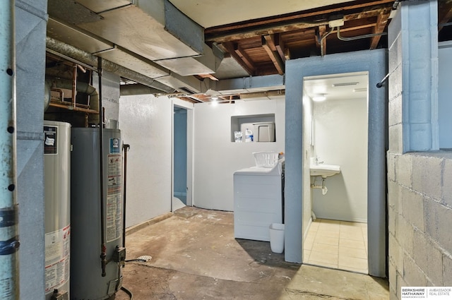 1409 S 17th St, Omaha, NE 68108 - unfinished below grade area with gas water heater and washer and dryer