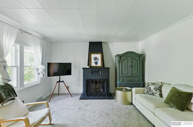 1409 S 17th St, Omaha, NE 68108 - carpeted living room with a brick fireplace and baseboards