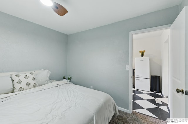 1409 S 17th St, Omaha, NE 68108 - carpeted bedroom with ceiling fan and baseboards