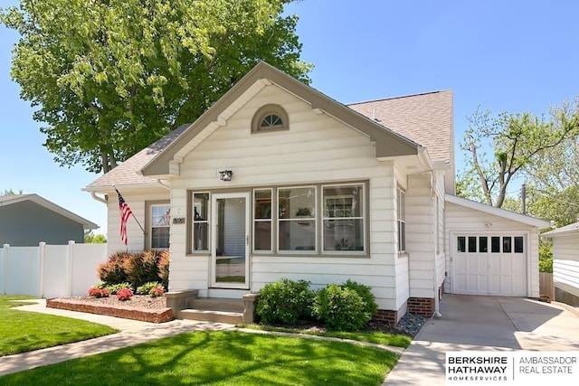 3120 N 205th St, Omaha, NE 68022 - view of front of house with driveway, an attached garage, and roof with shingles
