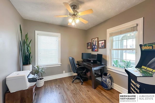 3120 N 205th St, Omaha, NE 68022 - office area with wood finished floors, ceiling fan, baseboards, and a textured ceiling
