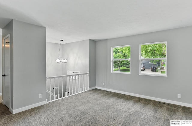 12956 Grand Ave, Omaha, NE 68164 - empty room featuring carpet flooring and baseboards