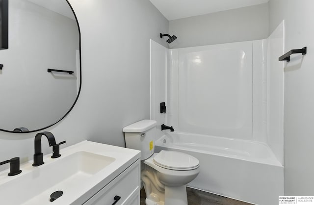 12956 Grand Ave, Omaha, NE 68164 - full bath with vanity, bathing tub / shower combination, toilet, and wood finished floors