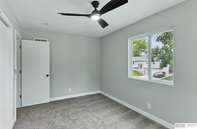 12956 Grand Ave, Omaha, NE 68164 - empty room featuring carpet floors, a ceiling fan, baseboards, and a smoke detector