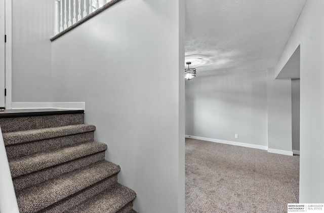 12956 Grand Ave, Omaha, NE 68164 - stairs with carpet and baseboards