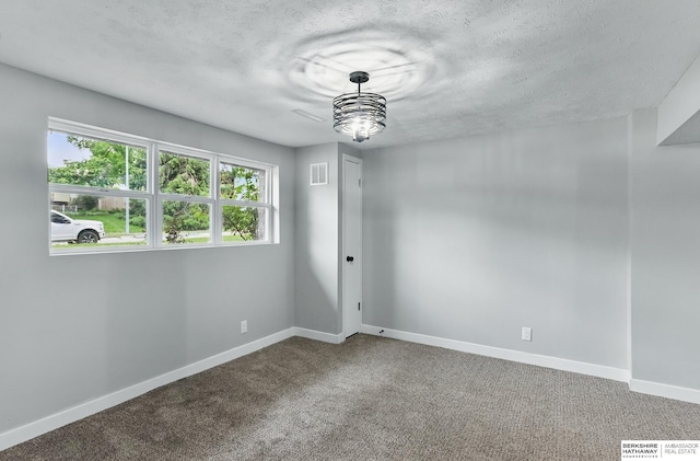 12956 Grand Ave, Omaha, NE 68164 - unfurnished room featuring baseboards, carpet, and a textured ceiling