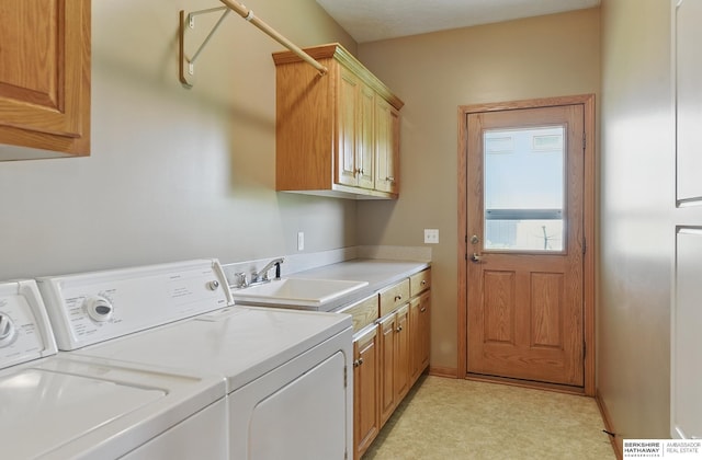 211 Longwood Dr, Papillion, NE 68133 - laundry room with separate washer and dryer, cabinet space, and light flooring