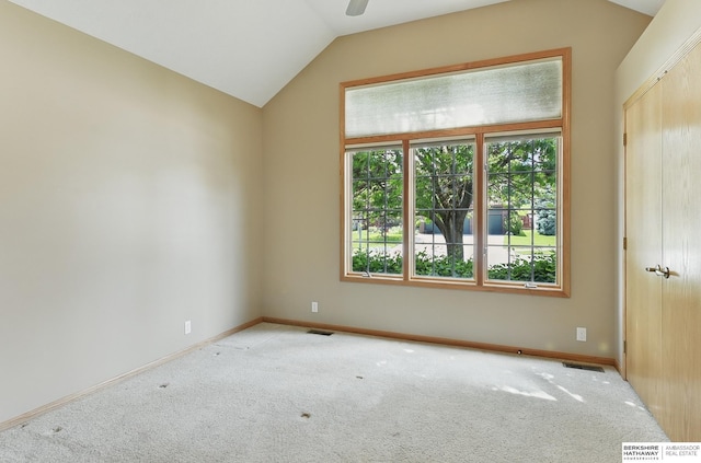 211 Longwood Dr, Papillion, NE 68133 - carpeted spare room with lofted ceiling, baseboards, and a ceiling fan