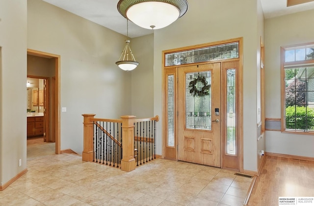 211 Longwood Dr, Papillion, NE 68133 - tiled entryway with baseboards