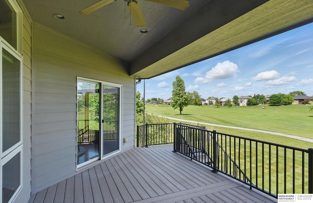 211 Longwood Dr, Papillion, NE 68133 - deck featuring ceiling fan, a lawn, and a residential view