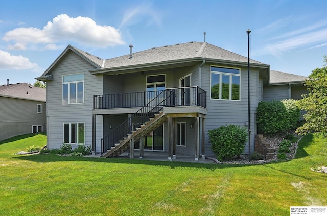 211 Longwood Dr, Papillion, NE 68133 - rear view of house with stairway and a lawn