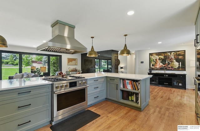 317 N 96th St, Omaha, NE 68114 - kitchen with high end stainless steel range oven, ventilation hood, gray cabinets, light countertops, and decorative light fixtures