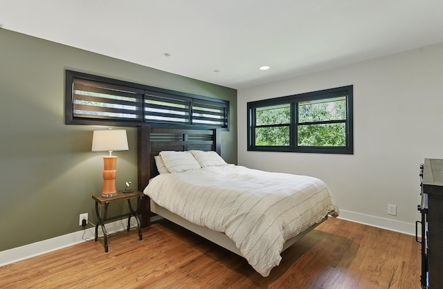 317 N 96th St, Omaha, NE 68114 - bedroom featuring baseboards, wood finished floors, and recessed lighting