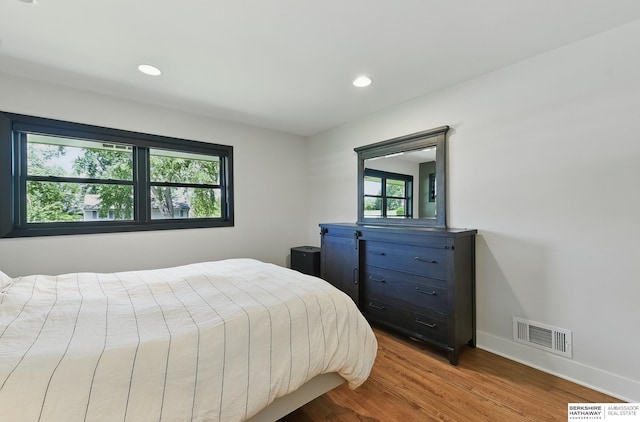317 N 96th St, Omaha, NE 68114 - bedroom with wood finished floors, recessed lighting, and baseboards