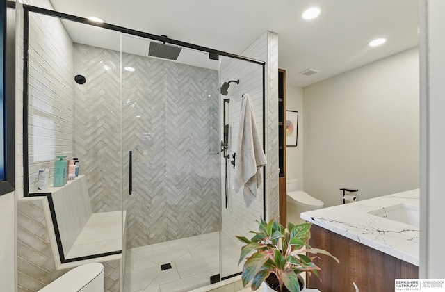 317 N 96th St, Omaha, NE 68114 - full bath featuring toilet, vanity, a shower stall, and recessed lighting