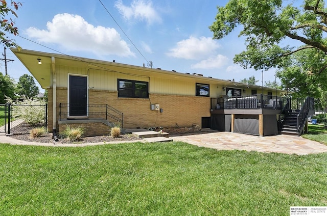 317 N 96th St, Omaha, NE 68114 - rear view of property featuring stairs, a patio, brick siding, and a wooden deck