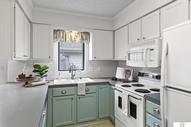 3400 Glenhaven Pl, Lincoln, NE 68506 - kitchen with white appliances, a sink, green cabinetry, white cabinetry, and crown molding