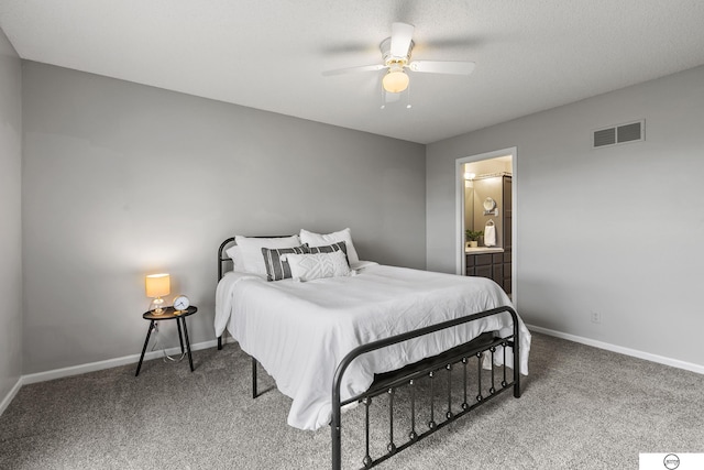 3400 Glenhaven Pl, Lincoln, NE 68506 - carpeted bedroom featuring baseboards, ensuite bath, and ceiling fan