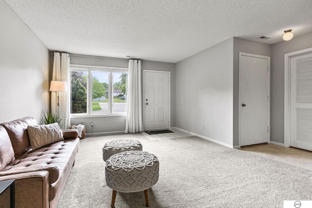3400 Glenhaven Pl, Lincoln, NE 68506 - living room featuring carpet floors, a textured ceiling, and baseboards