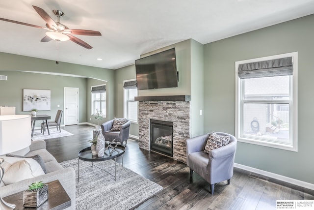 7812 S 196th St, Gretna, NE 68028 - living area with dark wood-style floors, ceiling fan, a stone fireplace, and recessed lighting
