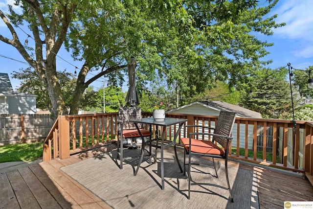 6458 Decatur St, Omaha, NE 68104 - wooden deck with outdoor dining area