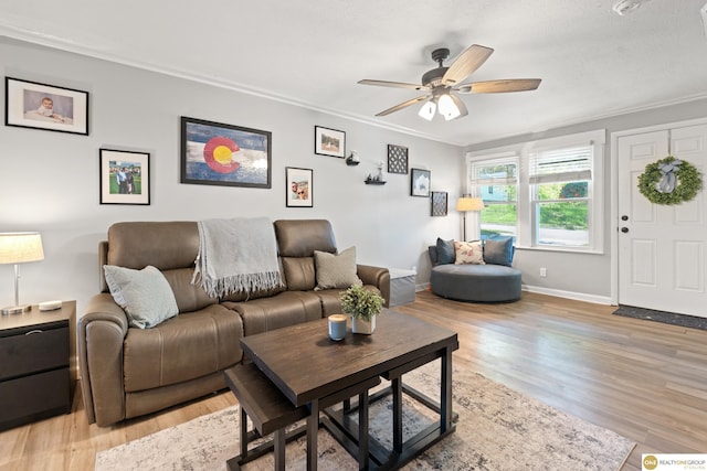 6458 Decatur St, Omaha, NE 68104 - living room with a ceiling fan, light wood-style flooring, ornamental molding, and baseboards