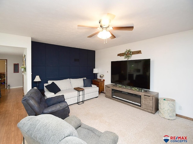 105 Nebraska St, Murdock, NE 68407 - living area with a ceiling fan, baseboards, and wood finished floors