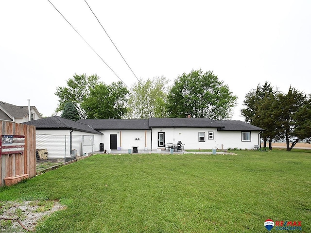 105 Nebraska St, Murdock, NE 68407 - rear view of house with a patio area