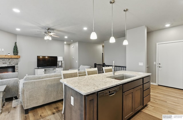 11745 S 113th St, Papillion, NE 68046 - kitchen with dishwasher, a sink, ceiling fan, light wood-type flooring, and recessed lighting