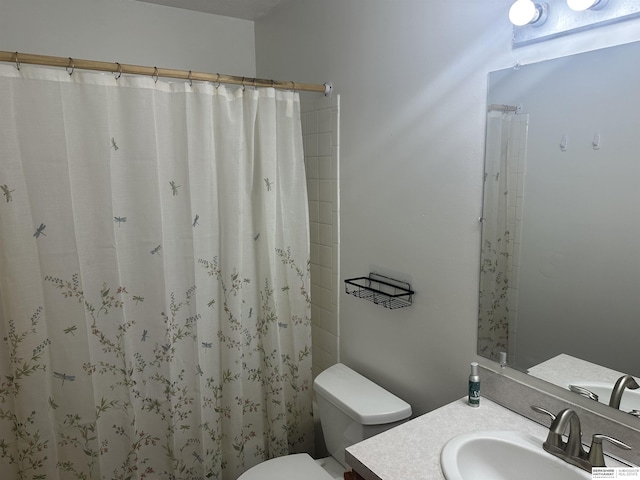 1745 Independence Cir, Lincoln, NE 68521 - bathroom with vanity, toilet, and a shower with shower curtain