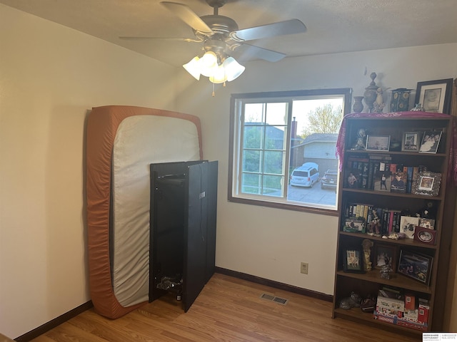 1745 Independence Cir, Lincoln, NE 68521 - dining area featuring a ceiling fan, wood finished floors, and baseboards