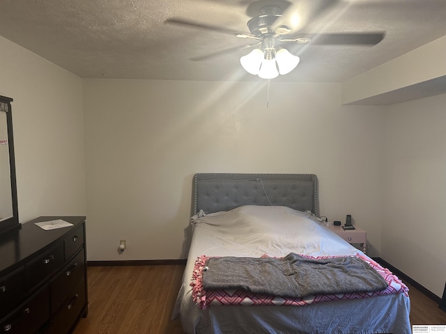1745 Independence Cir, Lincoln, NE 68521 - bedroom featuring wood finished floors, baseboards, and ceiling fan