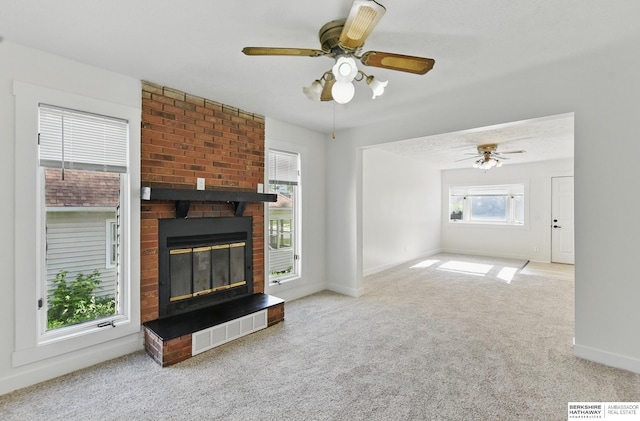 2544 N 64th St, Omaha, NE 68104 - unfurnished living room with plenty of natural light, carpet floors, and ceiling fan