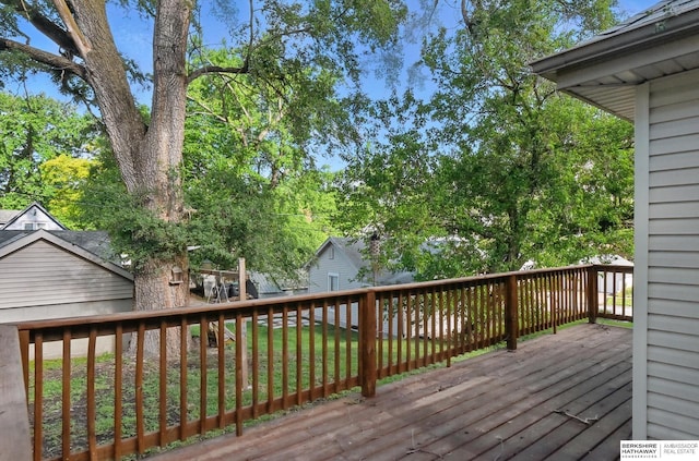2544 N 64th St, Omaha, NE 68104 - wooden terrace featuring a yard