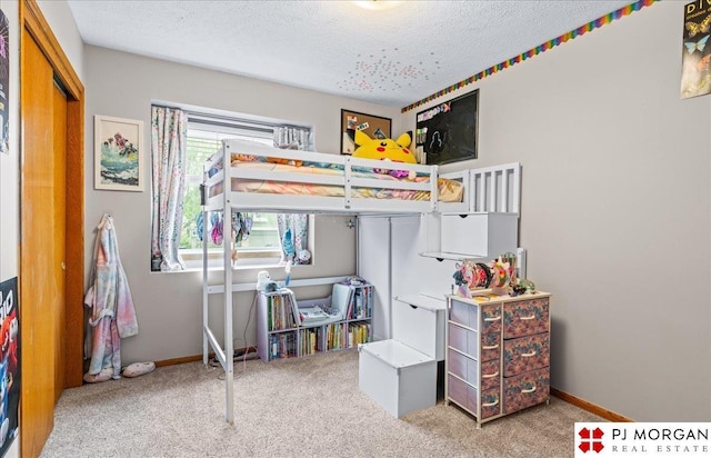 6718 Aspen St, La Vista, NE 68128 - bedroom featuring carpet, a textured ceiling, and baseboards