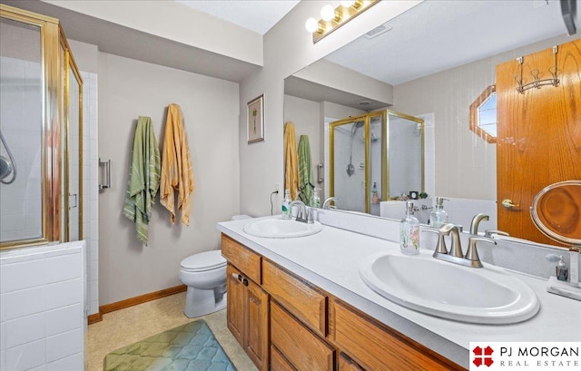 6718 Aspen St, La Vista, NE 68128 - bathroom with a shower stall, double vanity, and toilet