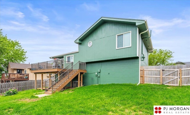6718 Aspen St, La Vista, NE 68128 - rear view of property featuring a wooden deck and stairway
