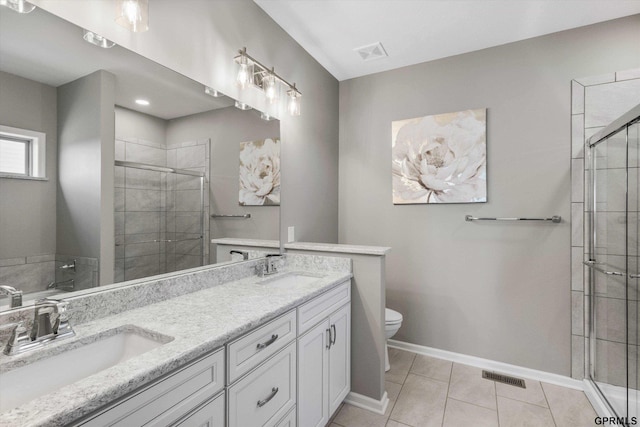 15301 Kansas Ave, Omaha, NE 68116 - full bathroom featuring a shower stall, toilet, double vanity, and baseboards
