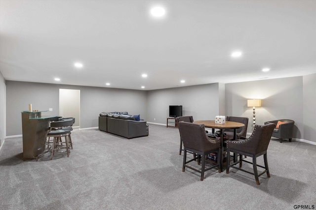 15301 Kansas Ave, Omaha, NE 68116 - carpeted dining area featuring recessed lighting, baseboards, and a bar