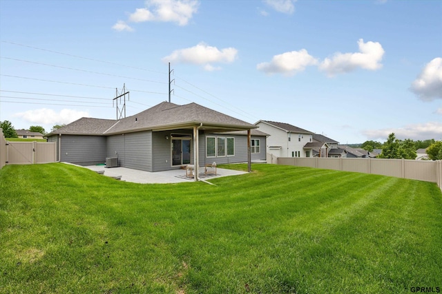 15301 Kansas Ave, Omaha, NE 68116 - rear view of house featuring a gate, a patio, and cooling unit