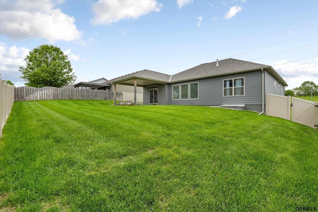 15301 Kansas Ave, Omaha, NE 68116 - back of house with a gate and a shingled roof