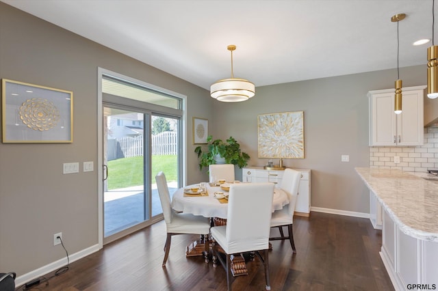 15301 Kansas Ave, Omaha, NE 68116 - dining space featuring dark wood-style flooring and baseboards