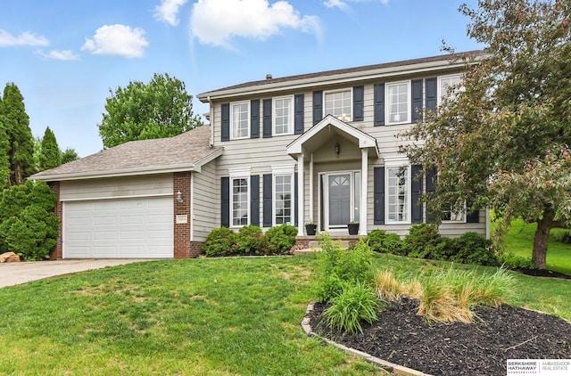 4414 S 174th St, Omaha, NE 68135 - colonial-style house featuring a garage, brick siding, driveway, and a front lawn