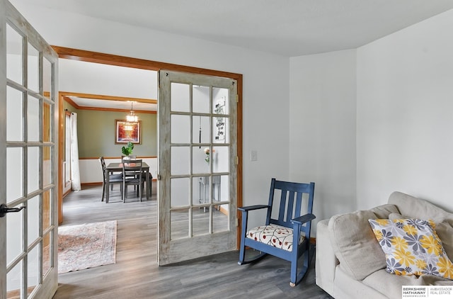 4414 S 174th St, Omaha, NE 68135 - living area featuring wood finished floors, french doors, and baseboards
