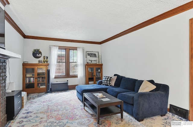 6920 N 30th St, Omaha, NE 68112 - carpeted living area featuring ornamental molding, a textured ceiling, and a fireplace