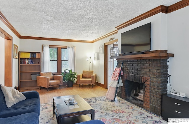 6920 N 30th St, Omaha, NE 68112 - living room with wood finished floors, crown molding, a textured ceiling, and a brick fireplace