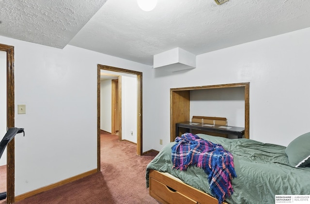 6920 N 30th St, Omaha, NE 68112 - carpeted bedroom featuring a textured ceiling and baseboards