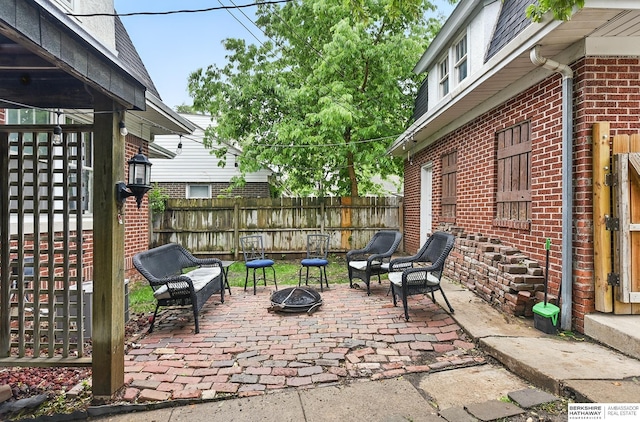 6920 N 30th St, Omaha, NE 68112 - view of patio with a fire pit